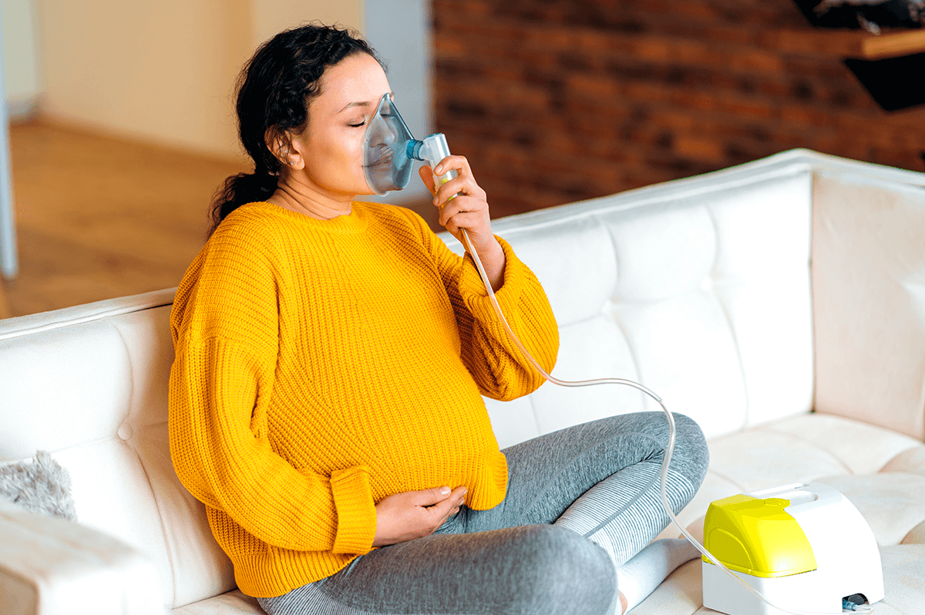 A pregnant woman makes an inhalation