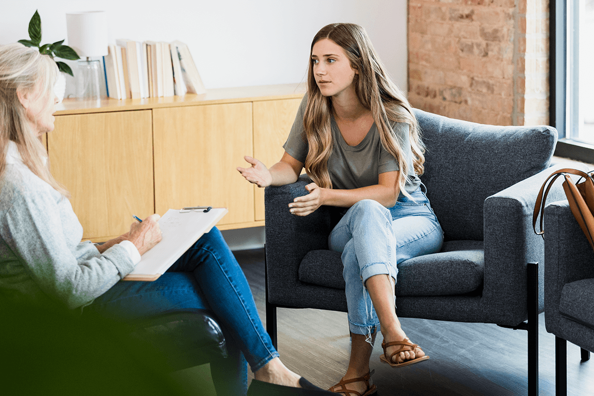 A woman during treatment with a therapist