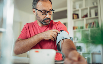 A man measures blood pressure