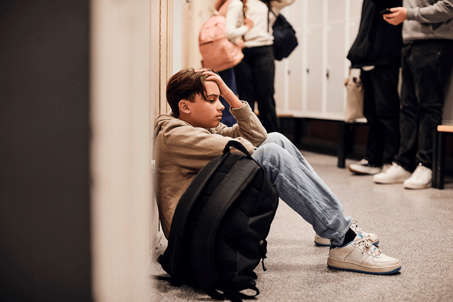 A teenage boy in a poor mental state