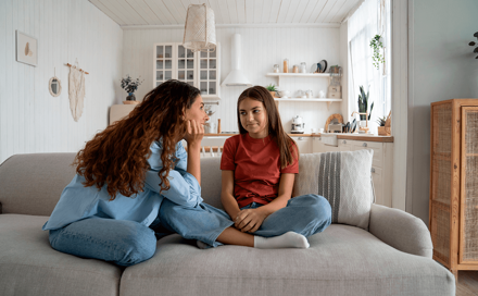 A mother is talking to her daughter