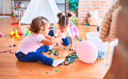 Children play with small parts