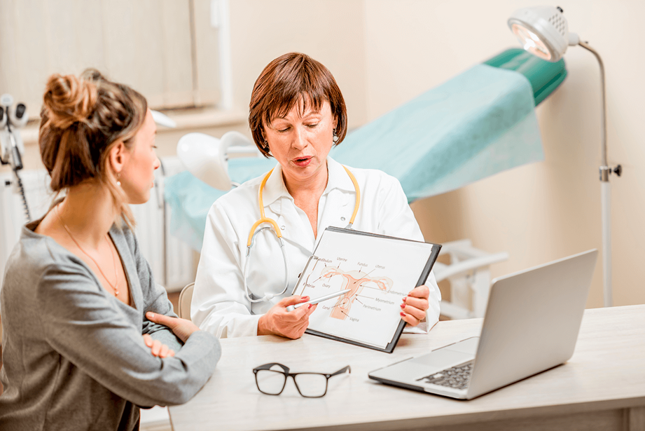 A woman being examined by a gynecologist